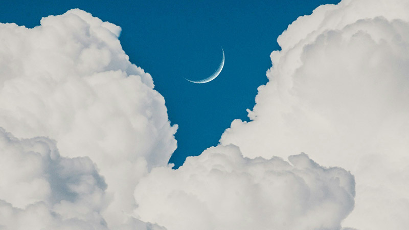 The moon in the dense clouds